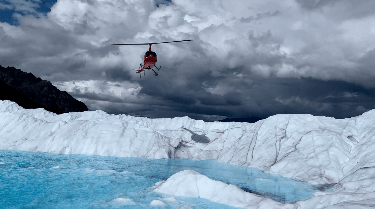 Alaska Helicopter Tour: Glacier Landing & Blue Pools Adventure photo 3