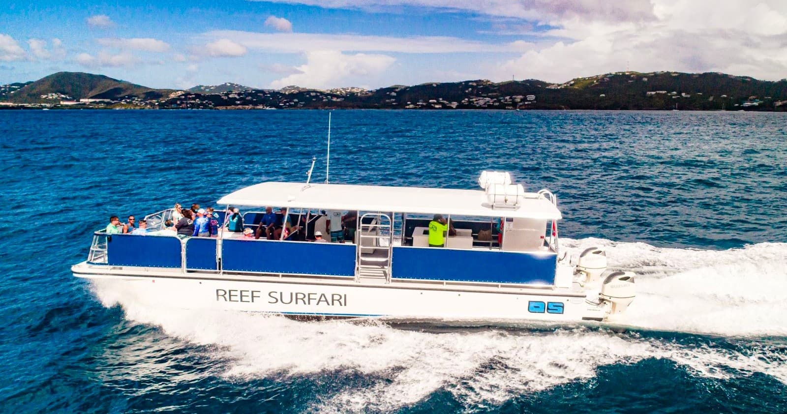 Reef Surfari boat cruising turquoise Caribbean waters