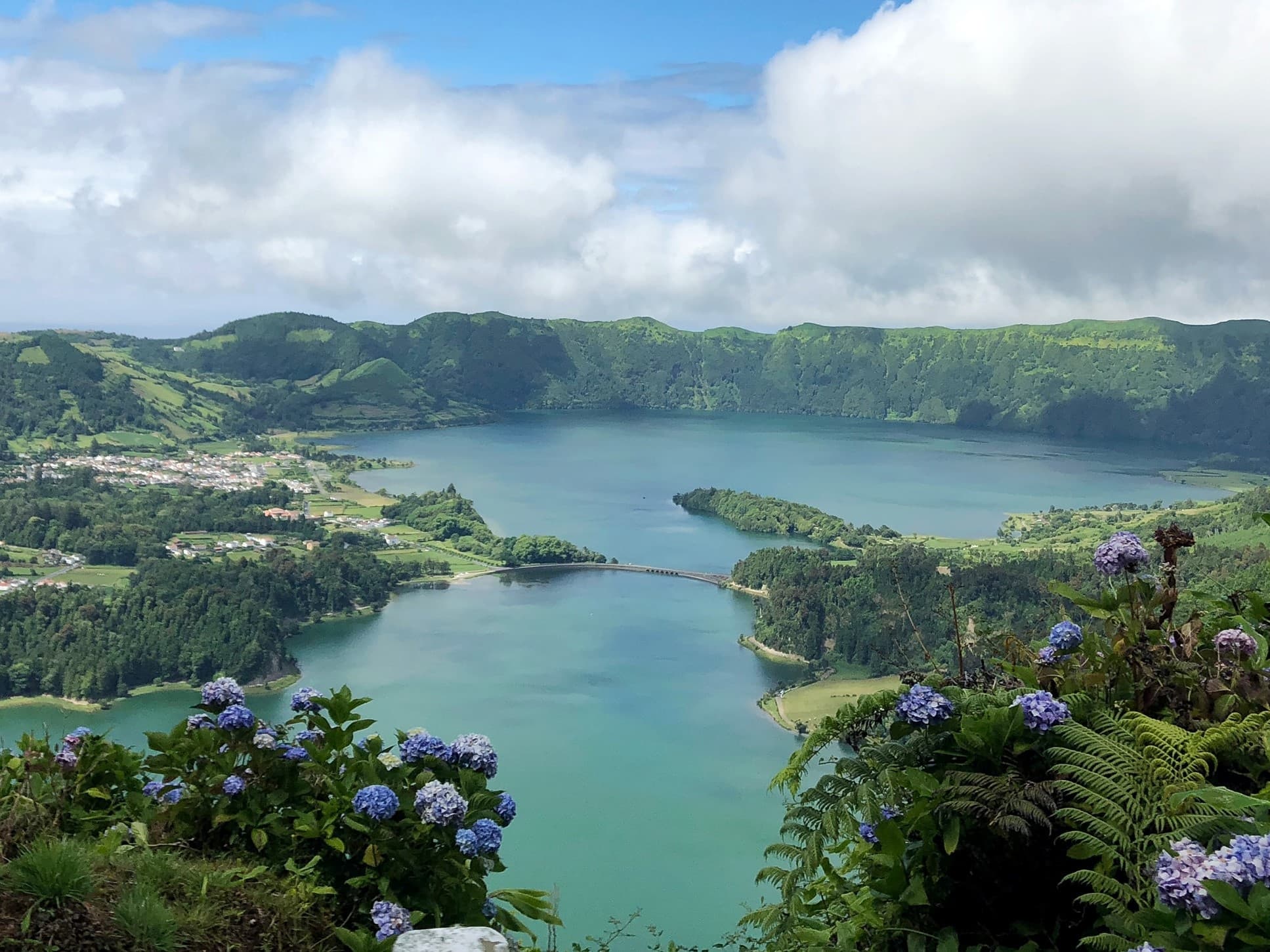 Lush twin-lake panoramic view with hiking trails in Azores