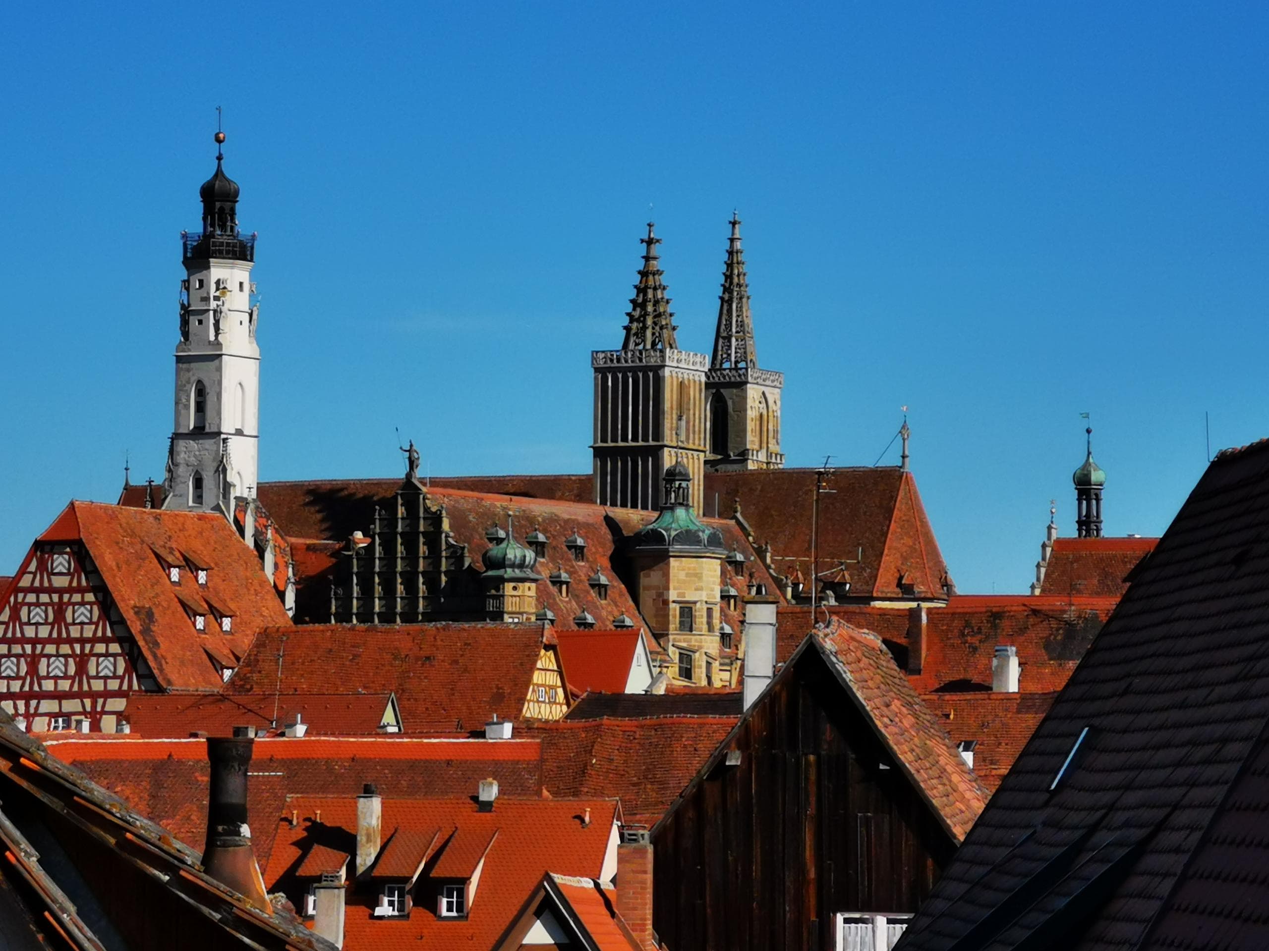 Historic town rooftops and church towers skyline view