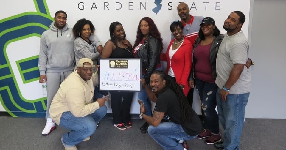 Team celebrating escape room win inside Garden State escape venue