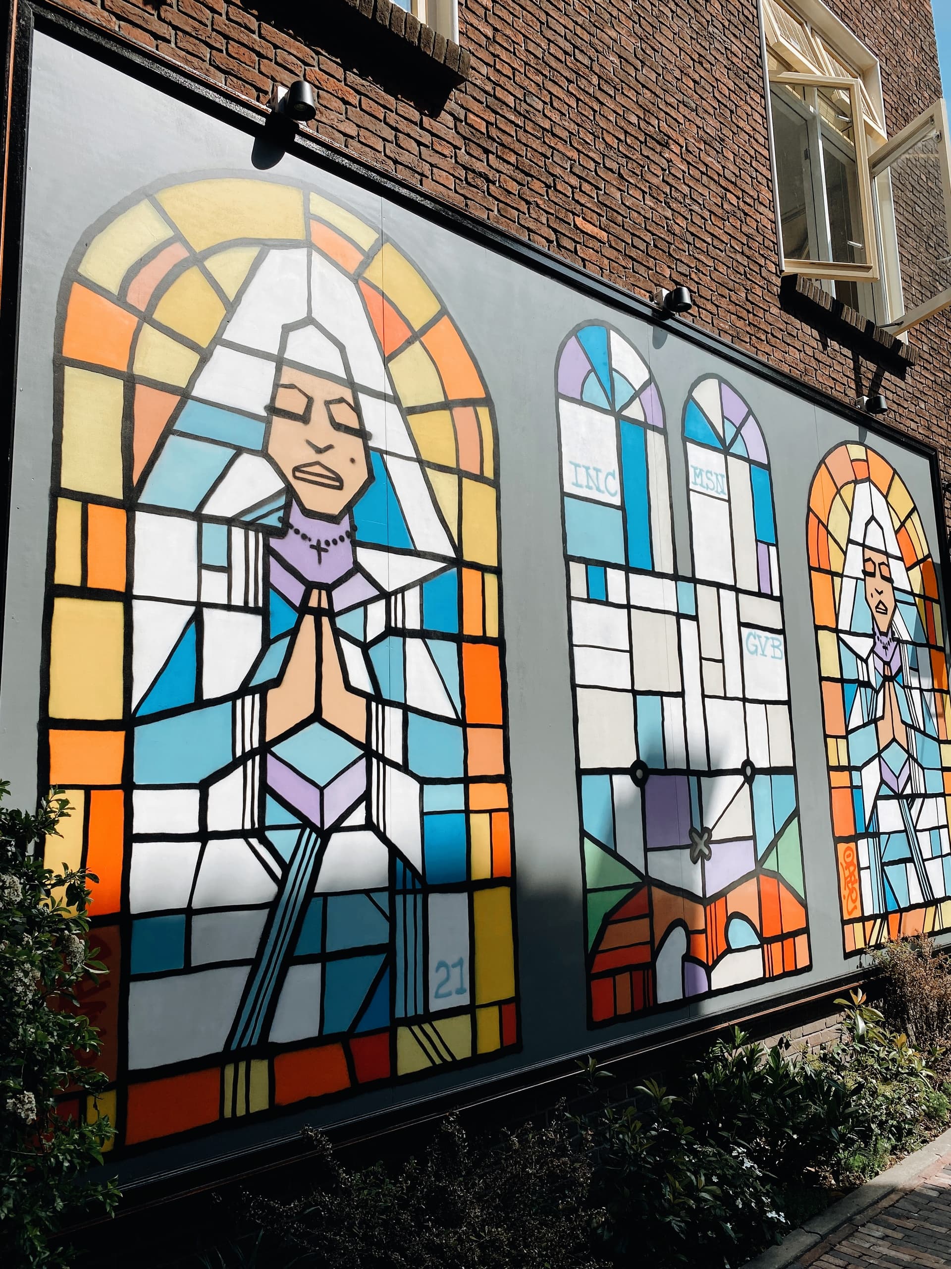 Colorful outdoor mural on Utrecht building, street art scene