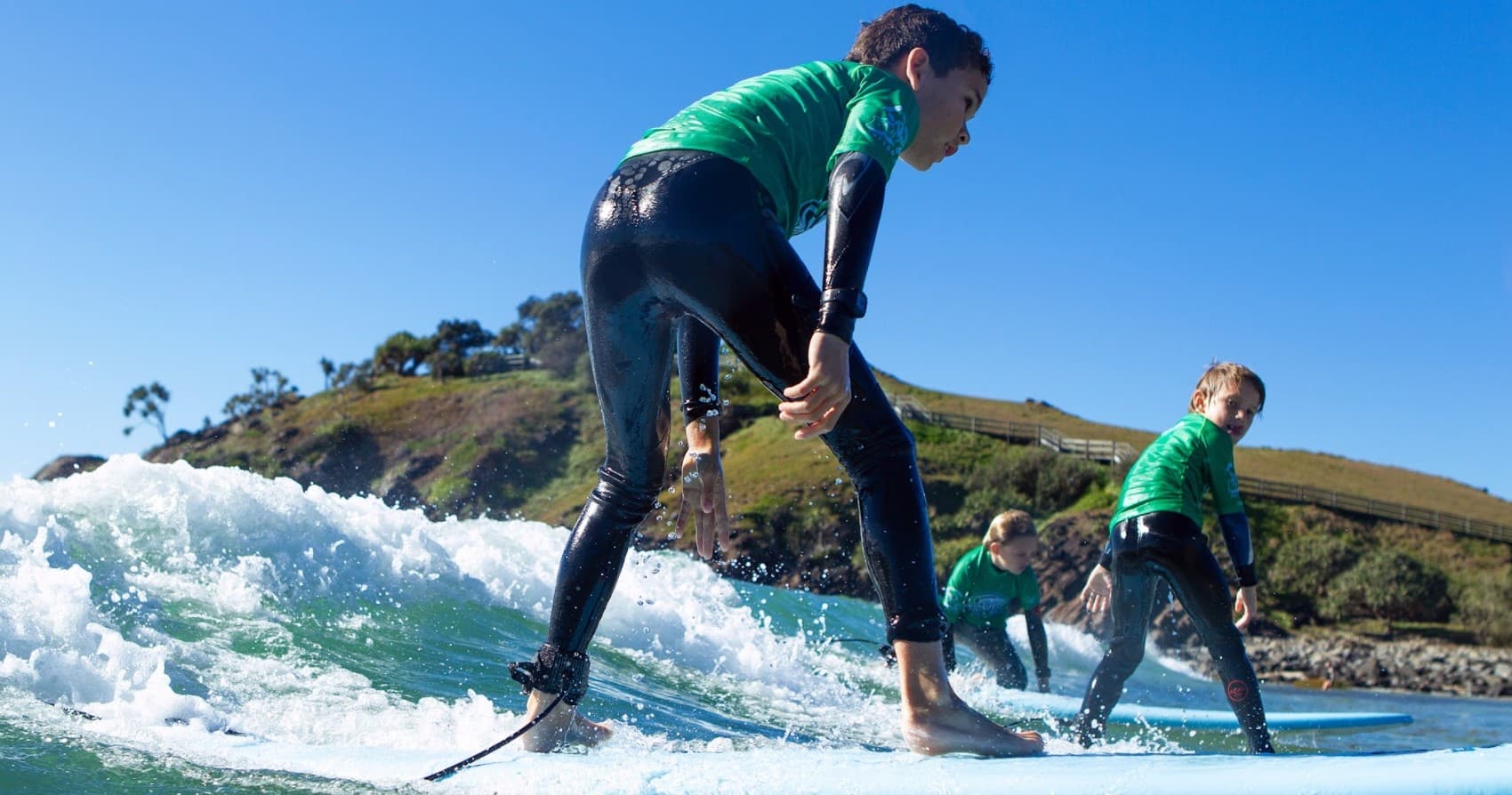 Woolworths SurfGroms Kids Surf Lessons with Go Ride A Wave
