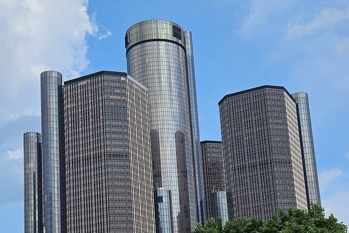 Exploring Detroit skyline with waterfront Renaissance Center towers