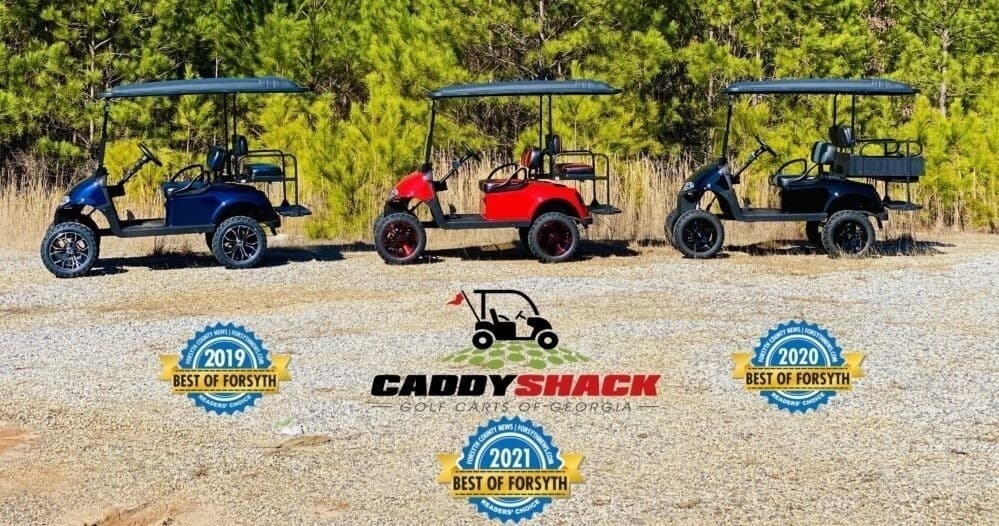 Outdoor golf carts parked in scenic forest gravel lot, Georgia