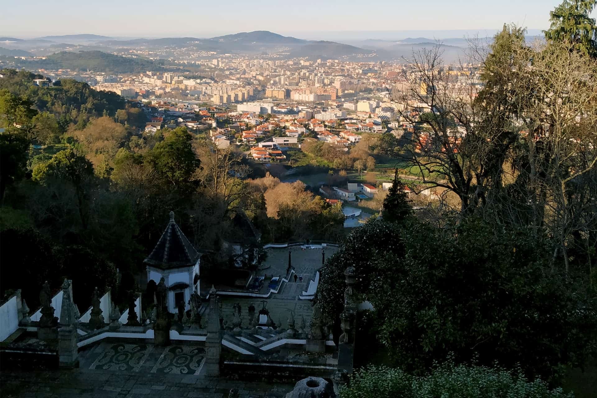 Scenic hillside overlook of historic city and valleys