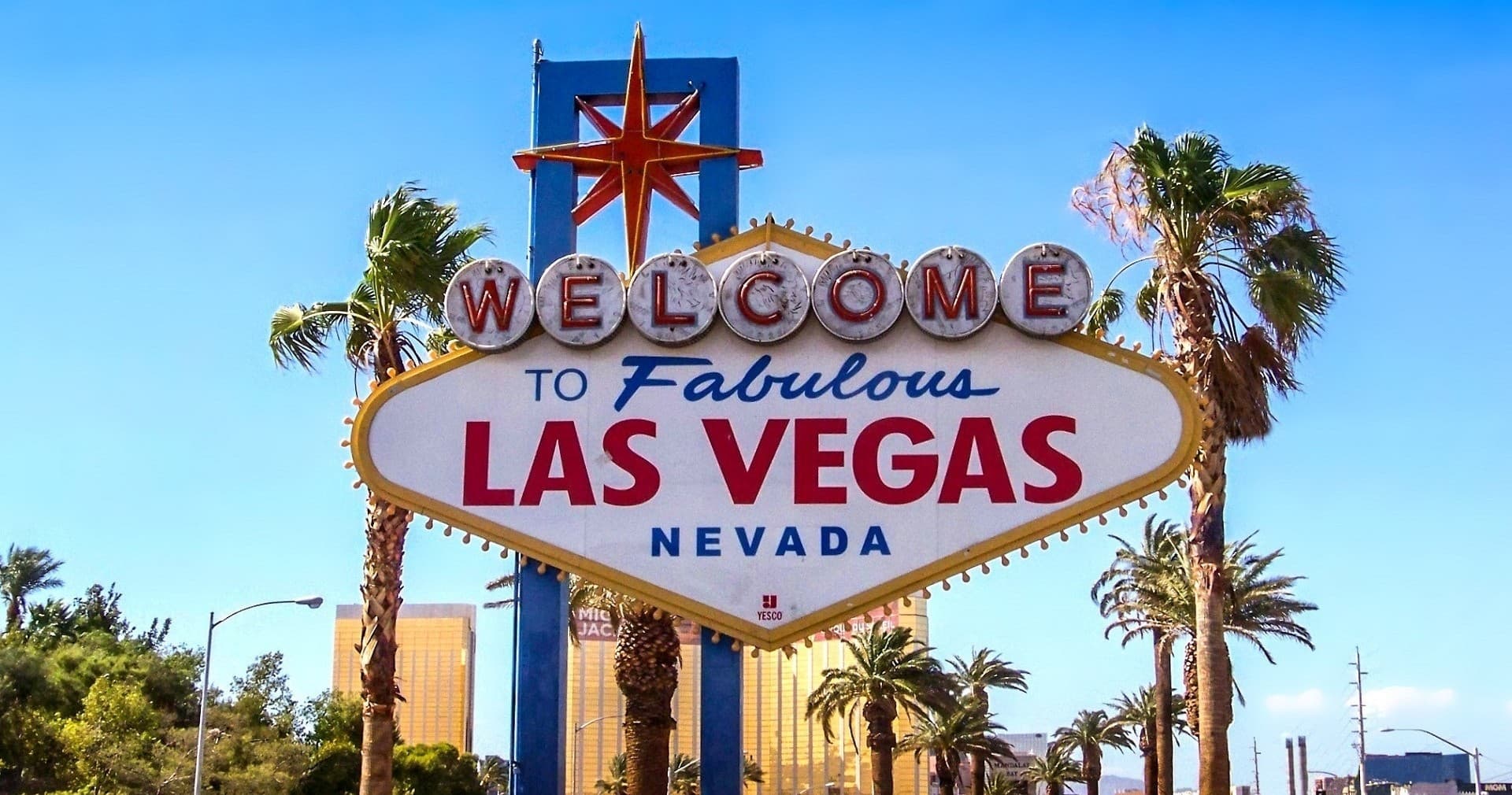 Welcome to Fabulous Las Vegas sign at city entrance with palms