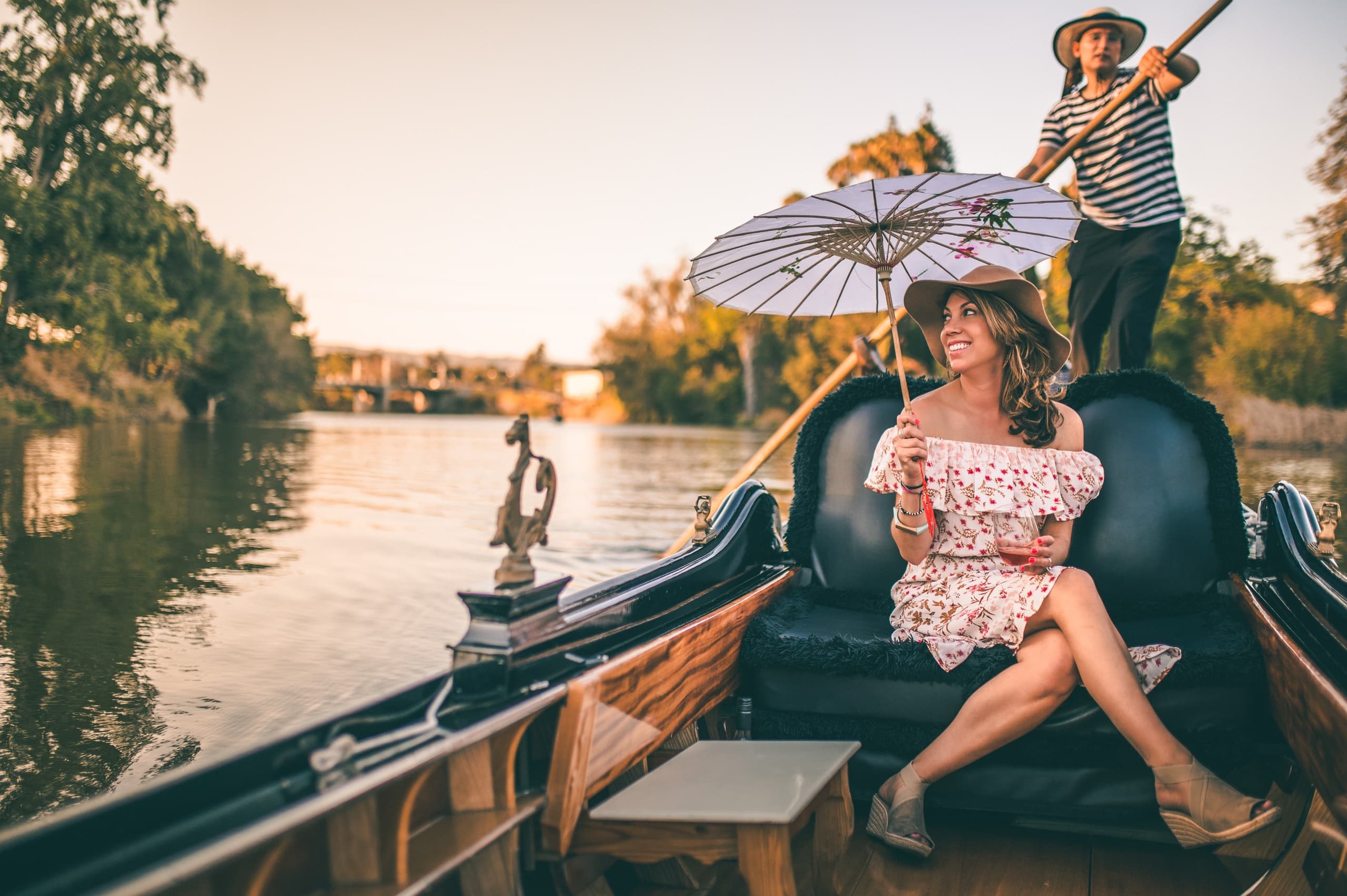 Romantic gondola ride at sunset on Napa River with couple