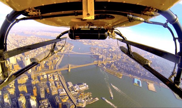 Helicopter cockpit view over NYC skyline during aerial tour