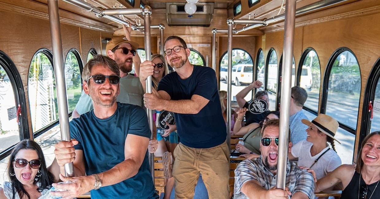 Group enjoying Music City trolley brewery tour through Nashville