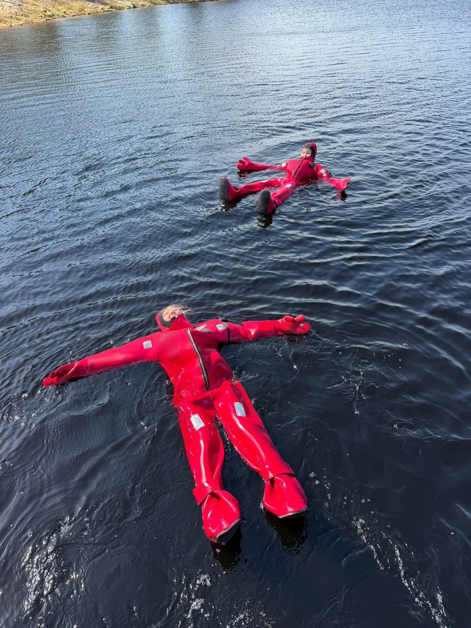 Float Under the Midnight Sun: Lake-Floating & Firelight near Rovaniemi photo 3