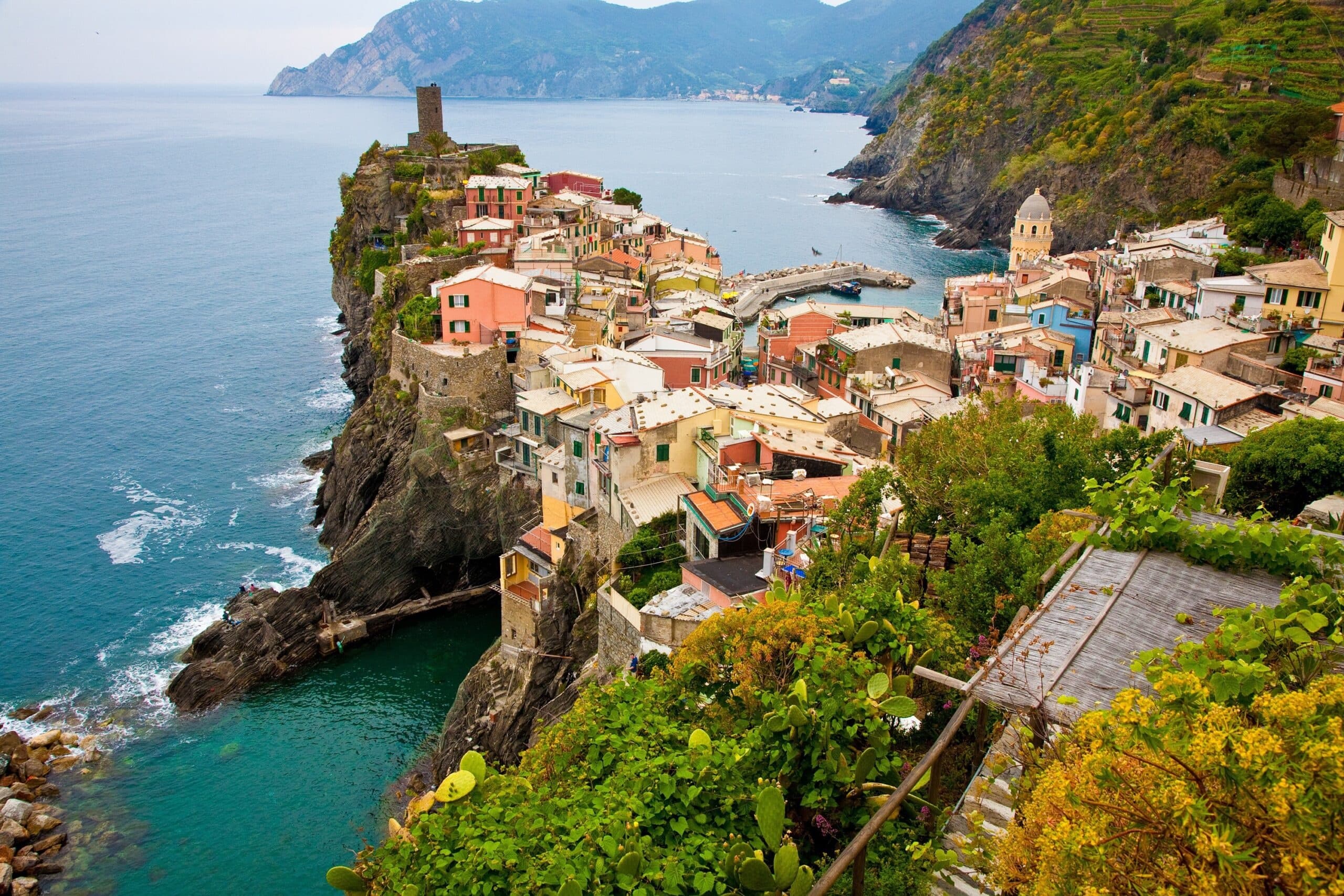 Aerial view of coastal village perched on rocky promontory