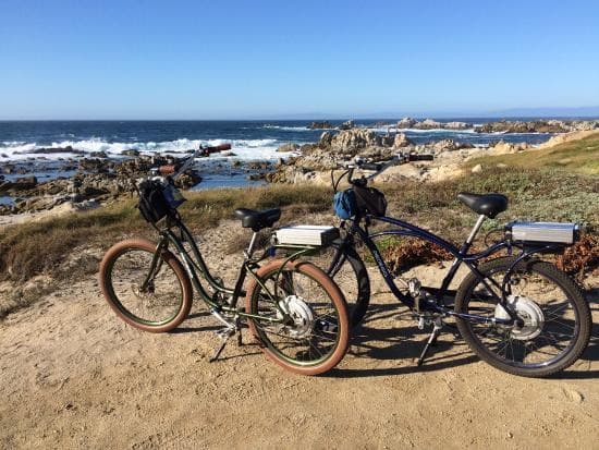 Bicycles parked on coastal bluff with ocean view