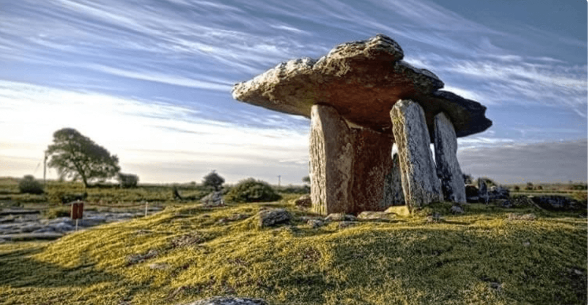 Ancient dolmen stone tomb on Galway countryside, heritage walking stop