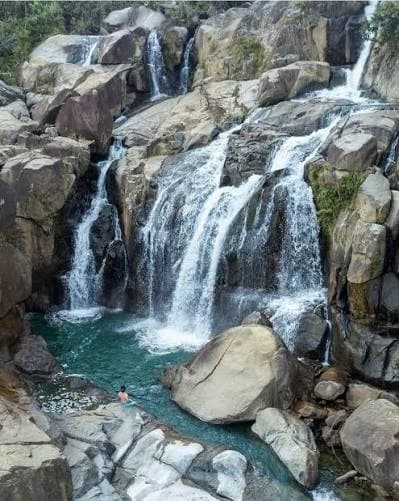 Discover Naguabo: South El Yunque Pools, Cayo Santiago Macaques, and Malecón Seafood photo 3