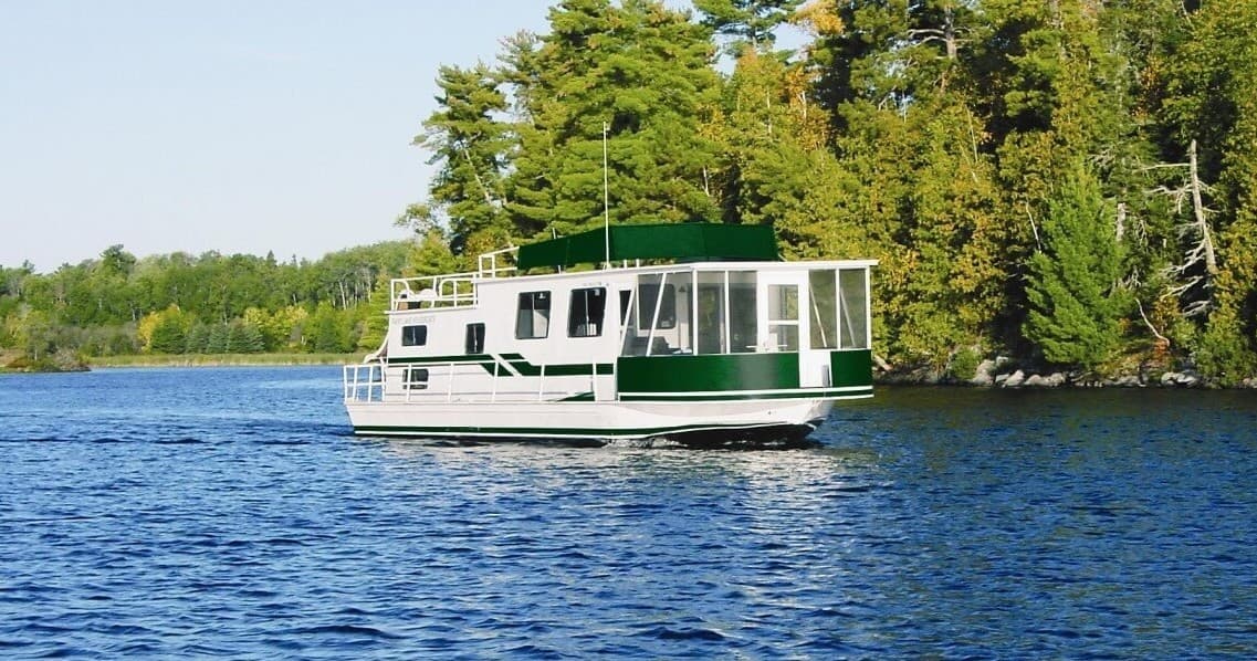Saginaw Houseboat on Rainy Lake: Dual-Engine Rental with Water Slide photo 1