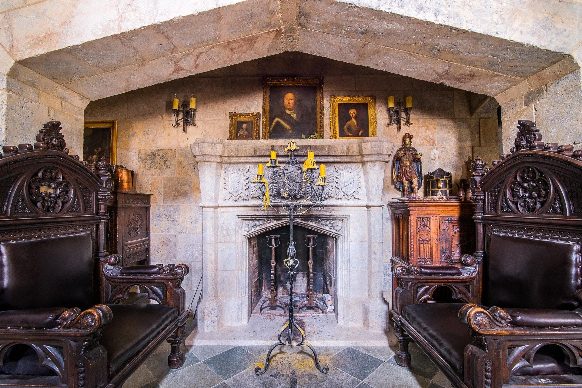 Ornate fireplace lounge in stone castle room for cozy gatherings