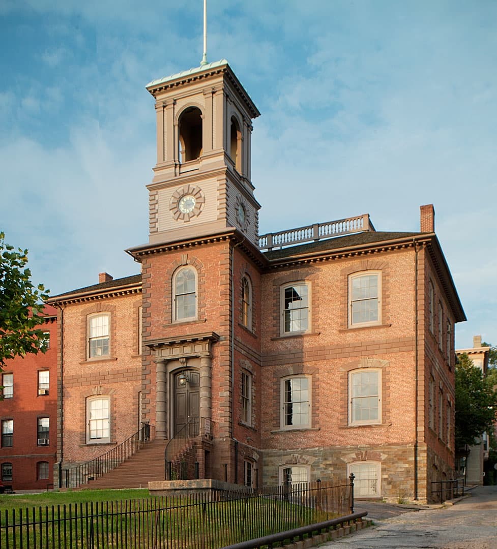 Historic brick town hall building in colonial Providence square