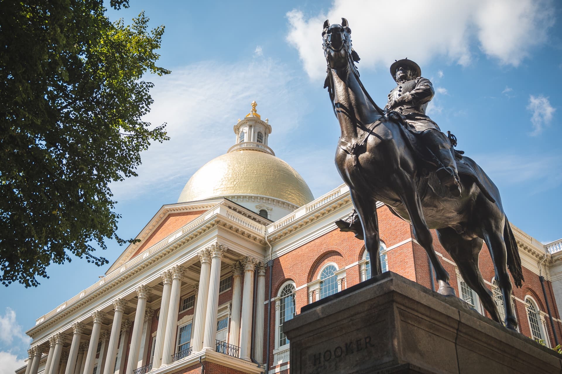 Massachusetts State House golden dome with equestrian statue