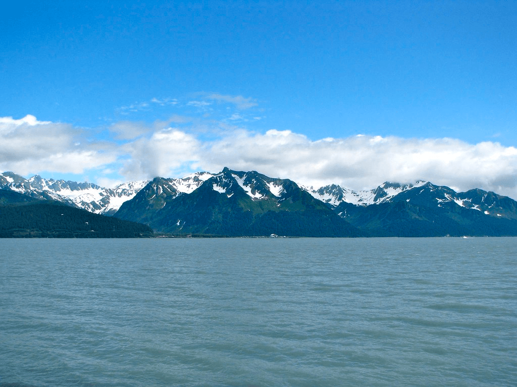 Scenic Alaskan coastal mountains and glacier-fed bay view