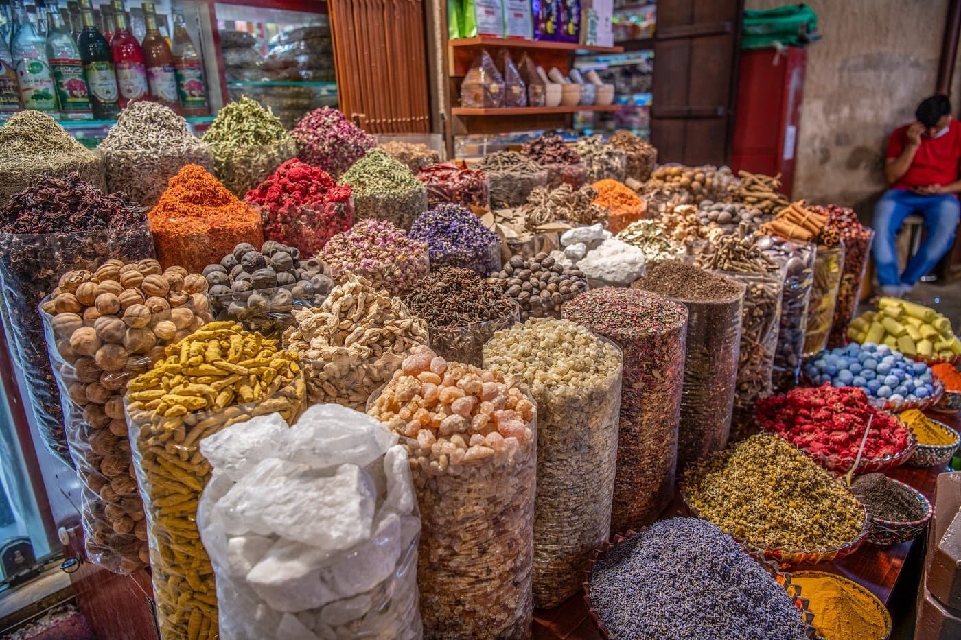 Colorful spice market stalls in souk, sensory food exploration