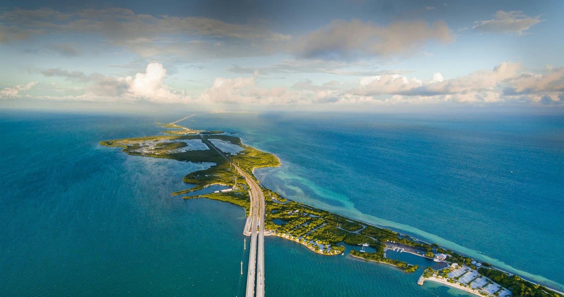 Scenic causeway bridge over turquoise waters to island keys