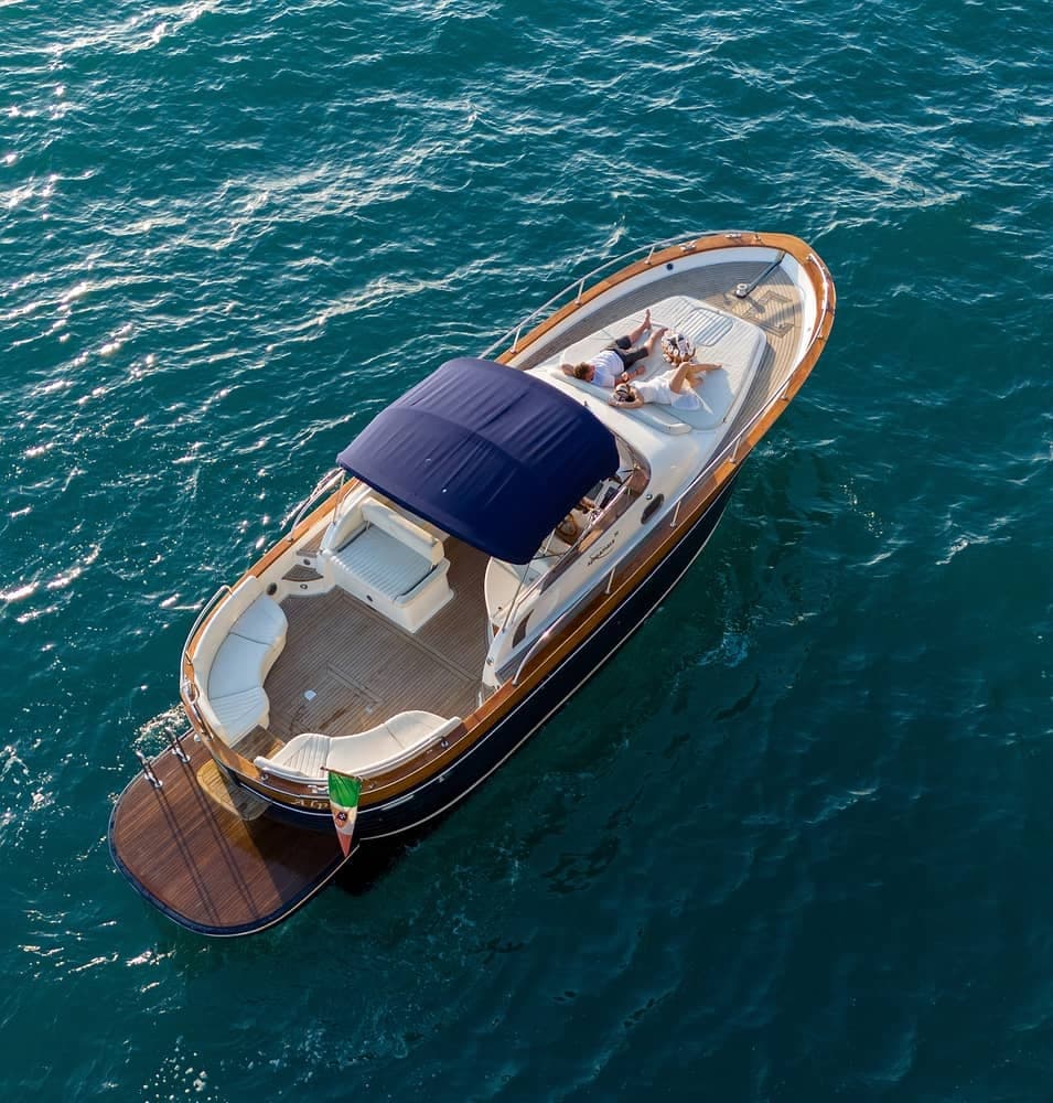 Luxury motorboat cruising over deep blue Mediterranean waters