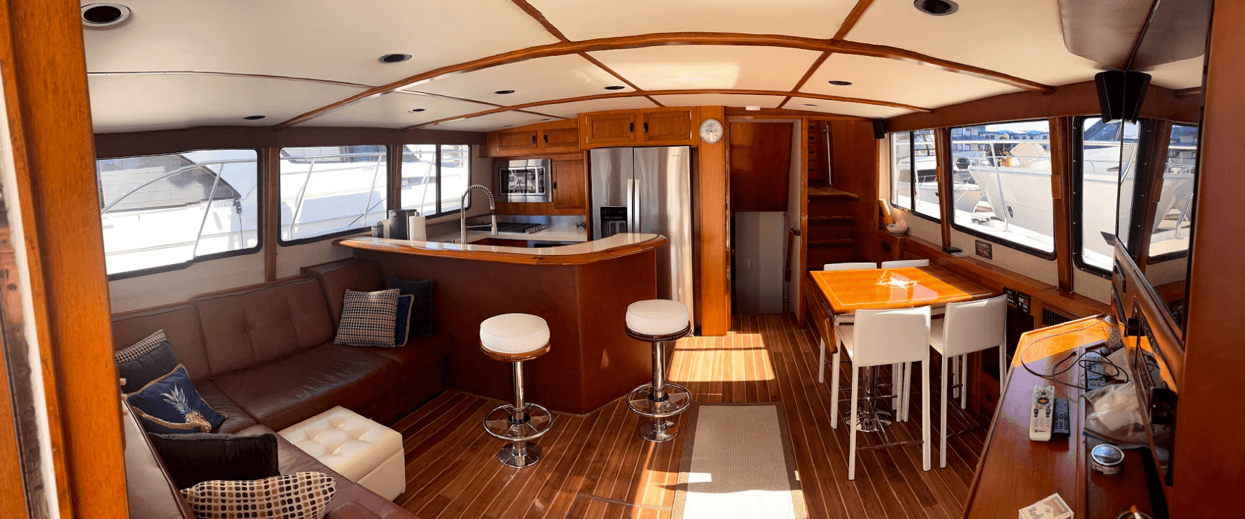 Boat interior salon and galley on fishing yacht, cabin lounge