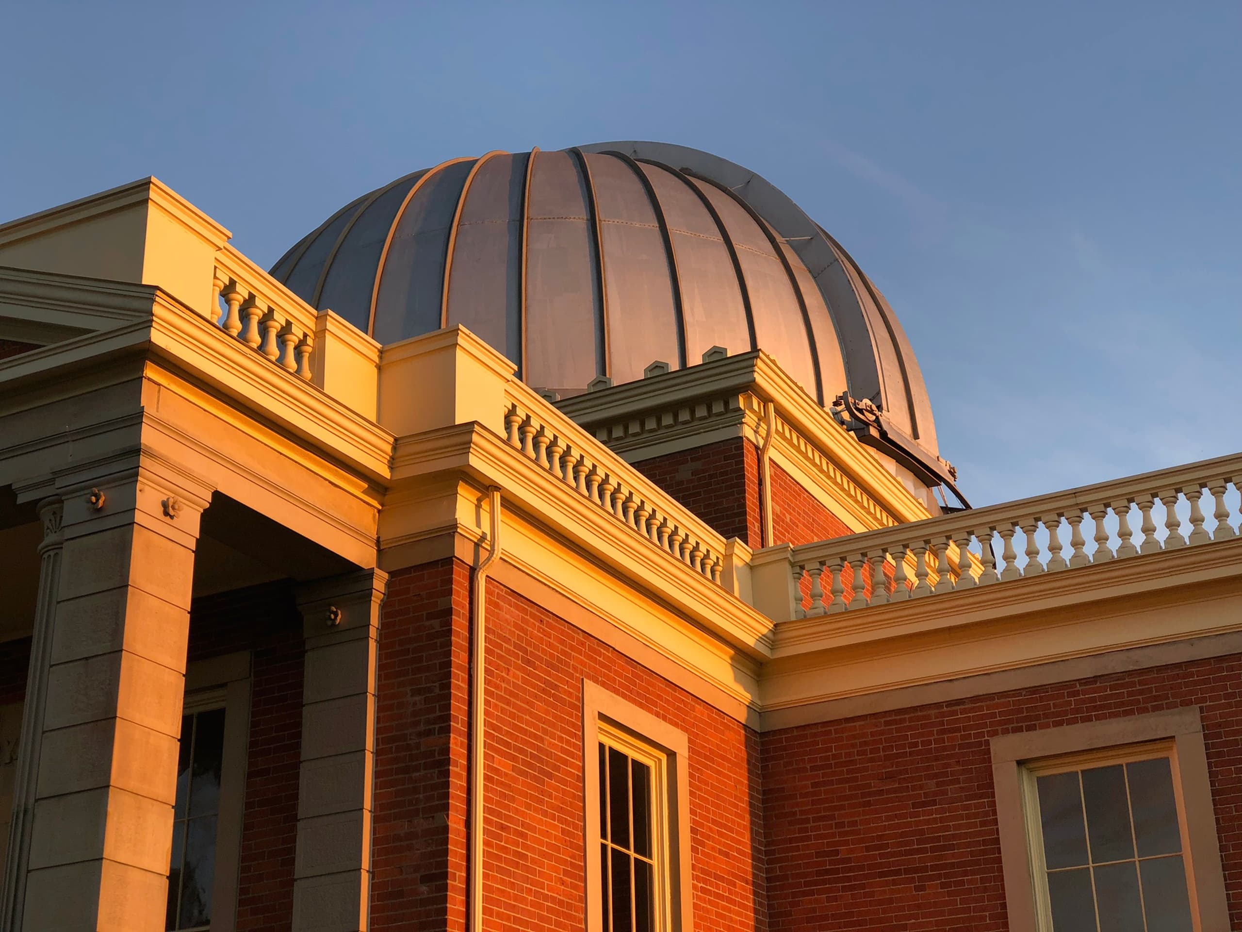Cincinnati Observatory exterior dome at golden hour, historic building