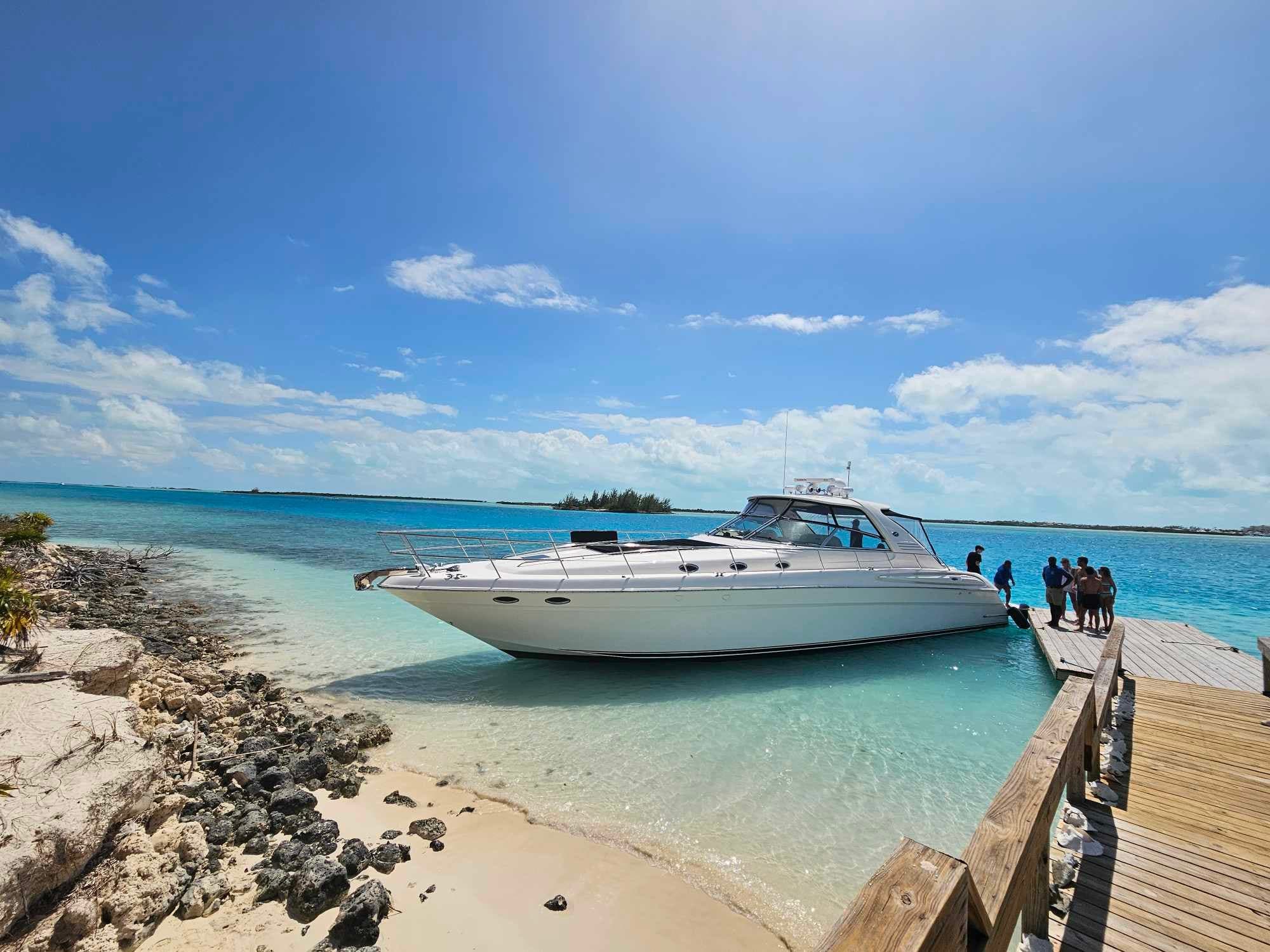 Full-Day 62' Yacht Charter in Grace Bay — Snorkel Sand Dollar Cove & Half Moon Bay photo 1