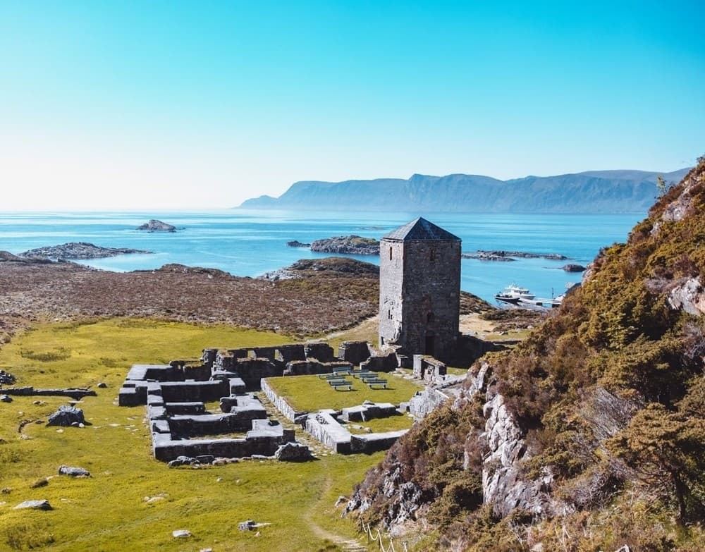 Coastal ruins and rocky shoreline with ocean vistas