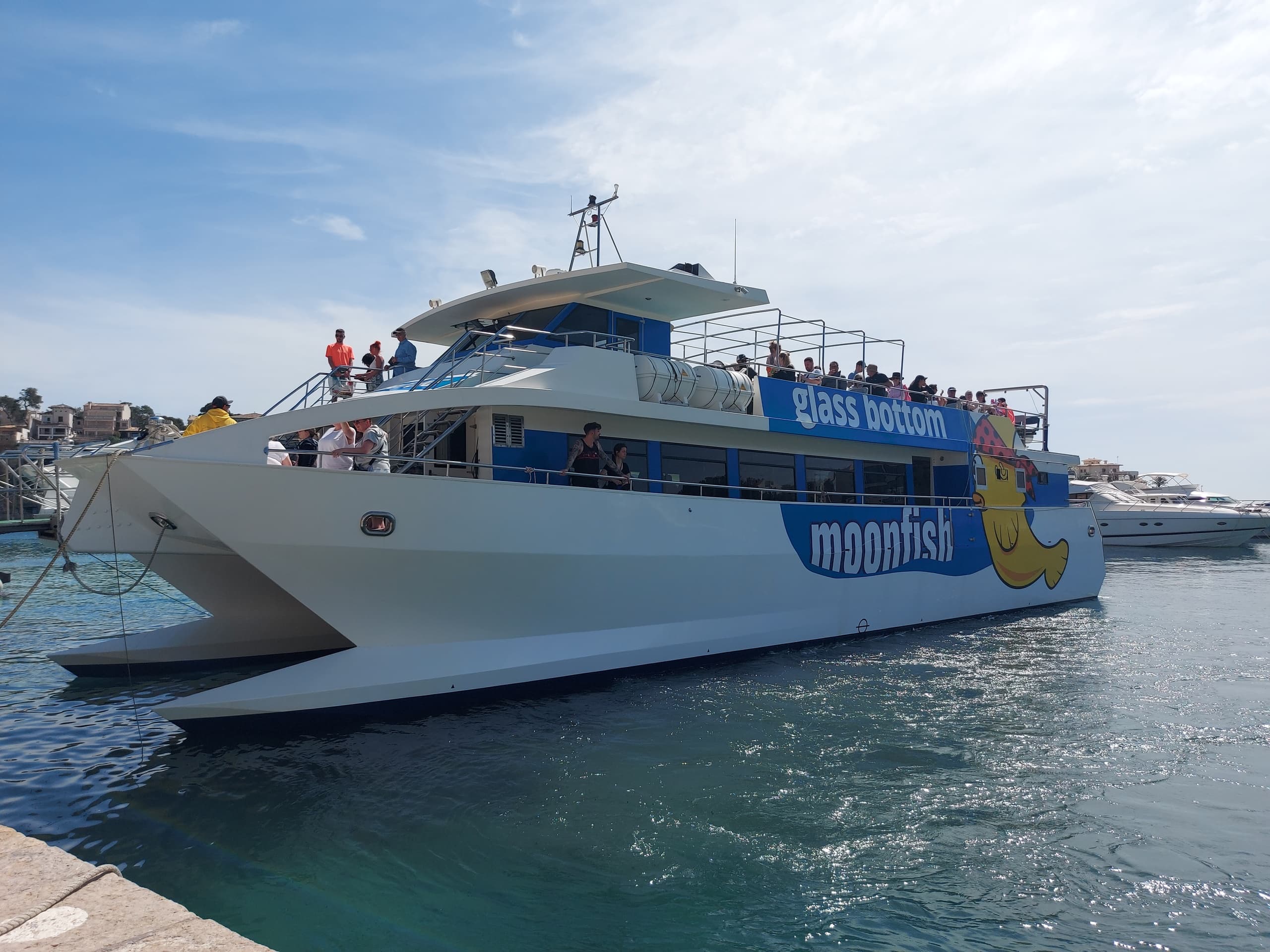 Boat Shuttle to Cala Millor with Moonfish Glassbottom Catamaran