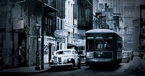 Vintage streetcar on urban street depicting historic city tram ride