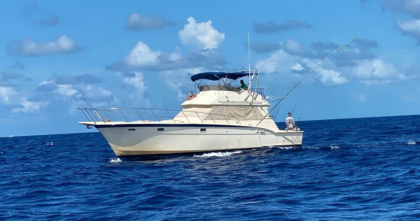 Sportfishing charter boat cruising clear blue waters off Key West