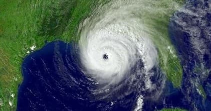 Satellite image of hurricane over Gulf Coast with clear eye
