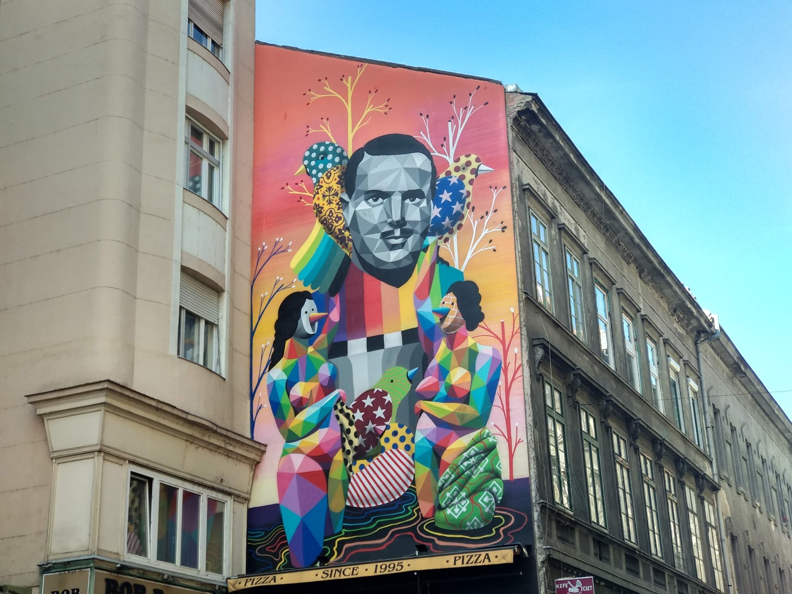Large geometric mural on Budapest building showcasing street art