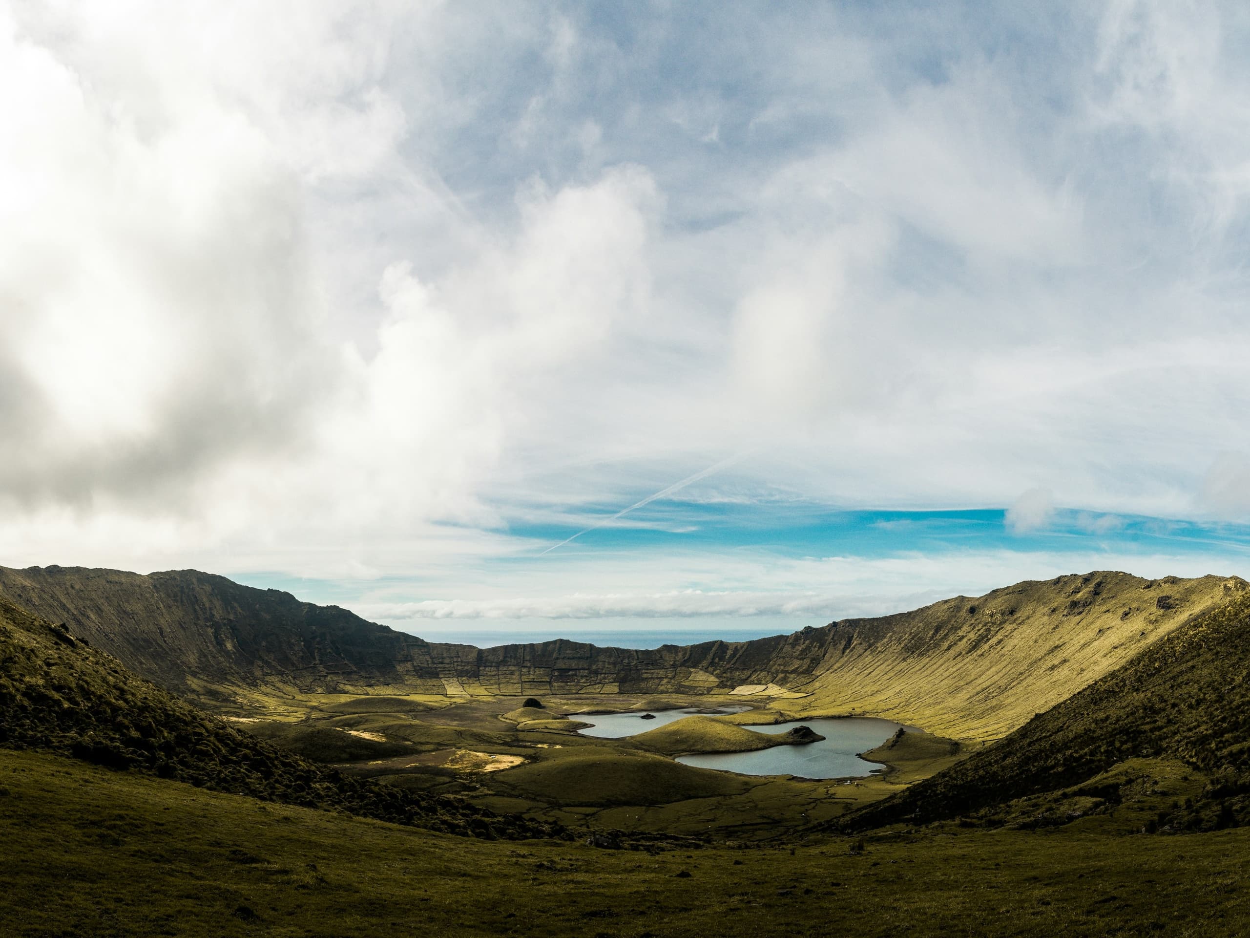 Wide volcanic valley panorama with lakes and hiking trails
