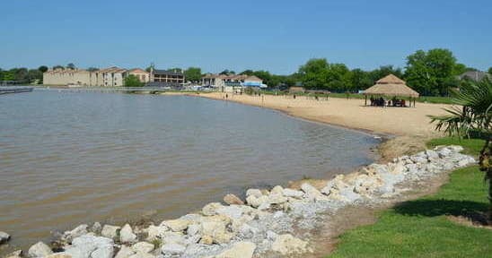 Lakeside beach at Granbury, Texas with calm sandy shoreline