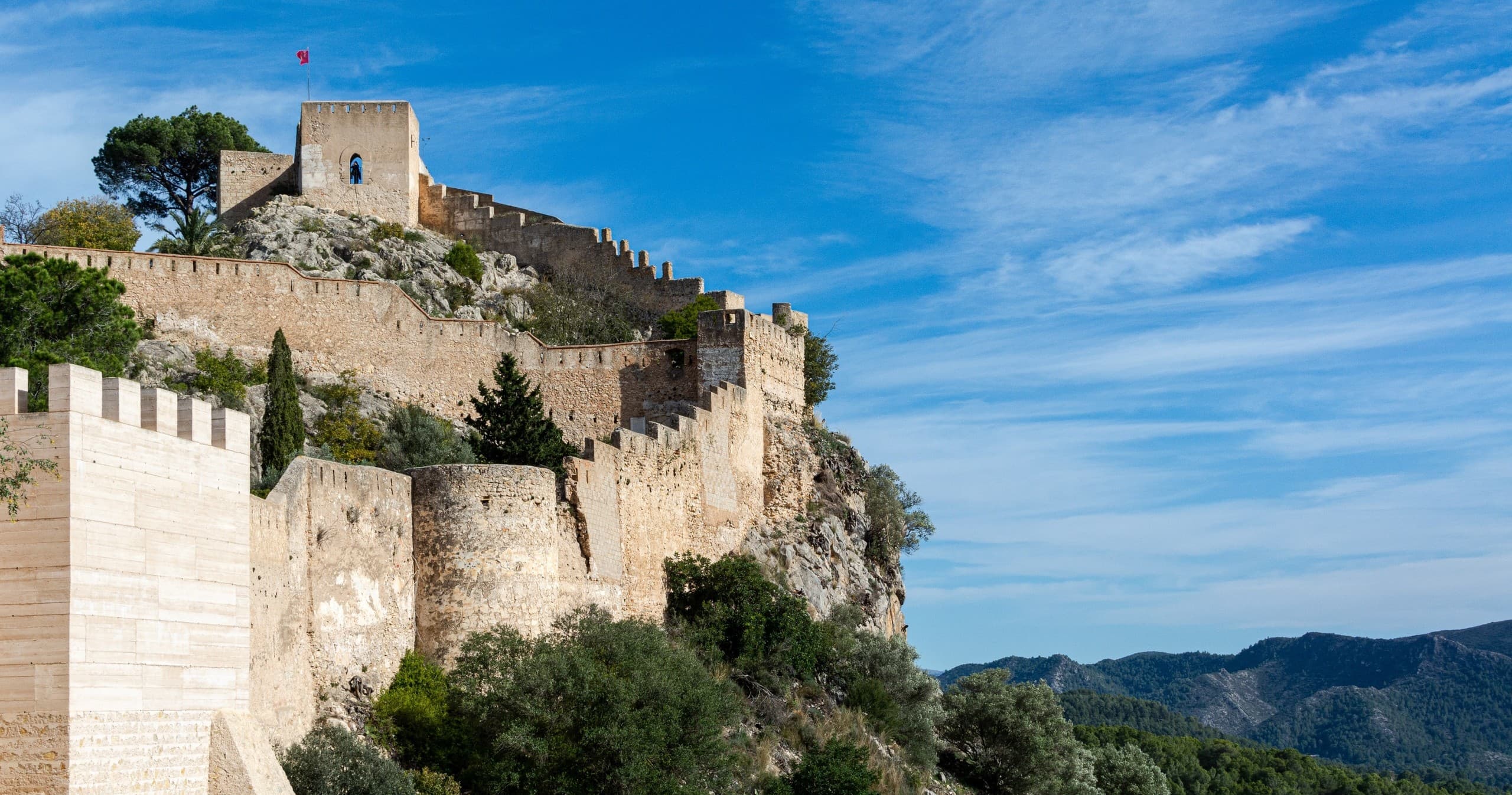 Wide panoramic valley and mountain ridgeline ideal for hiking Spain
