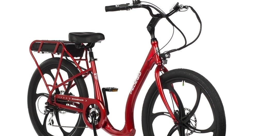 Red electric city commuter bike studio image with rear cargo rack