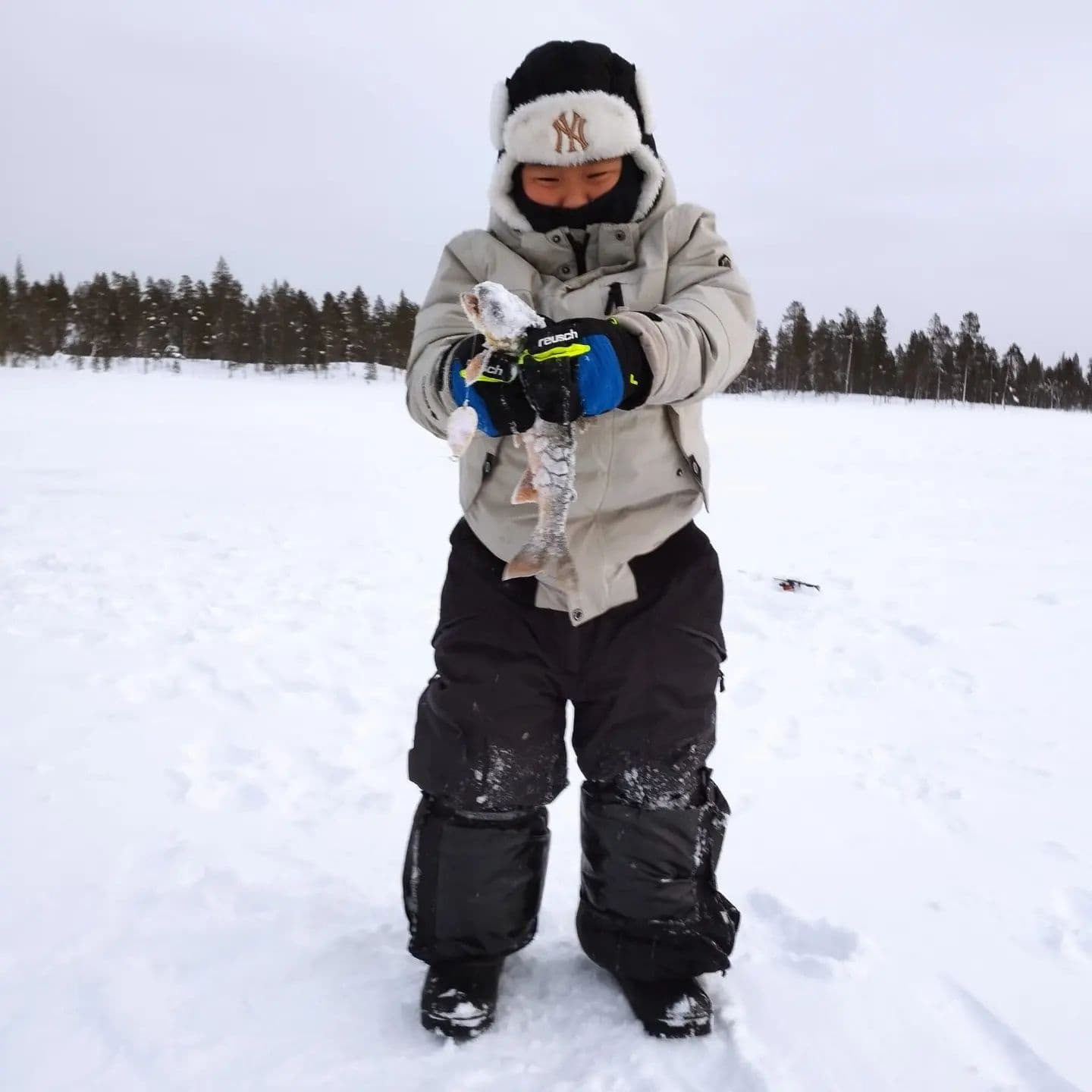 Ice Fishing Adventure in Lapland with Arctic Tours