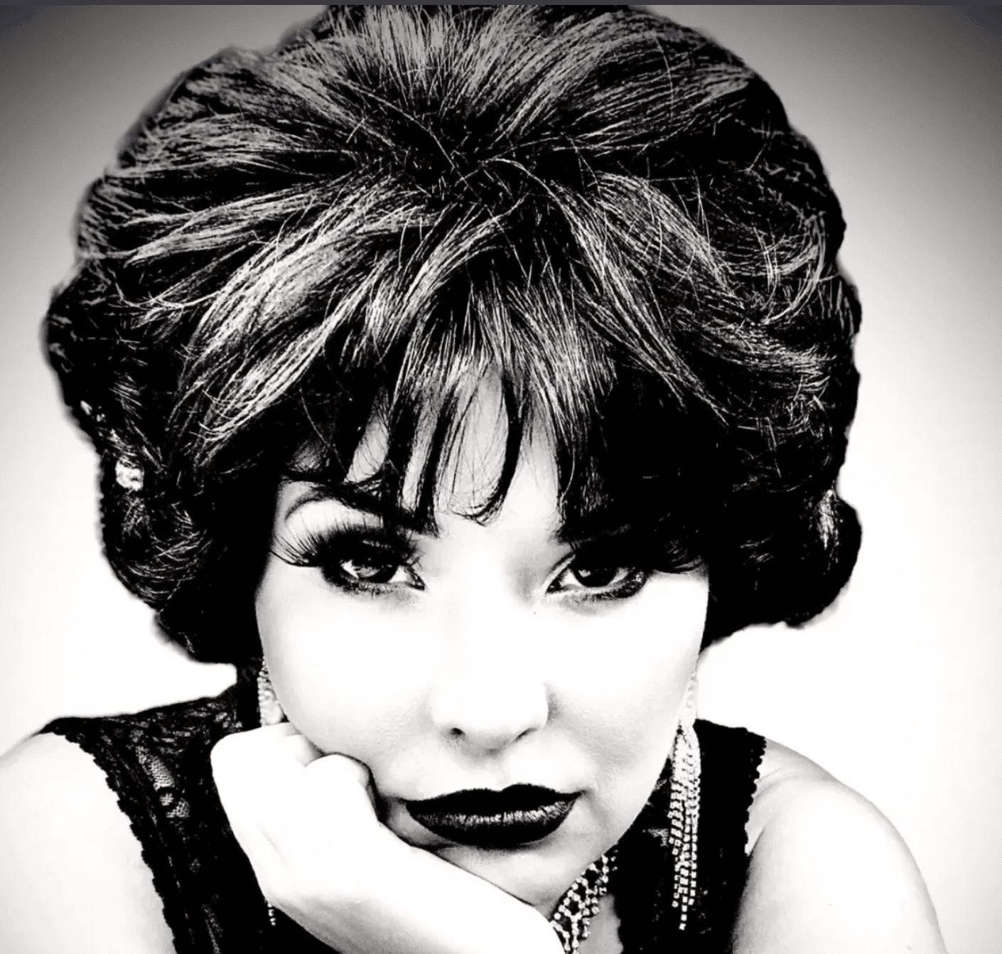 Studio portrait of female vocalist in classic black and white