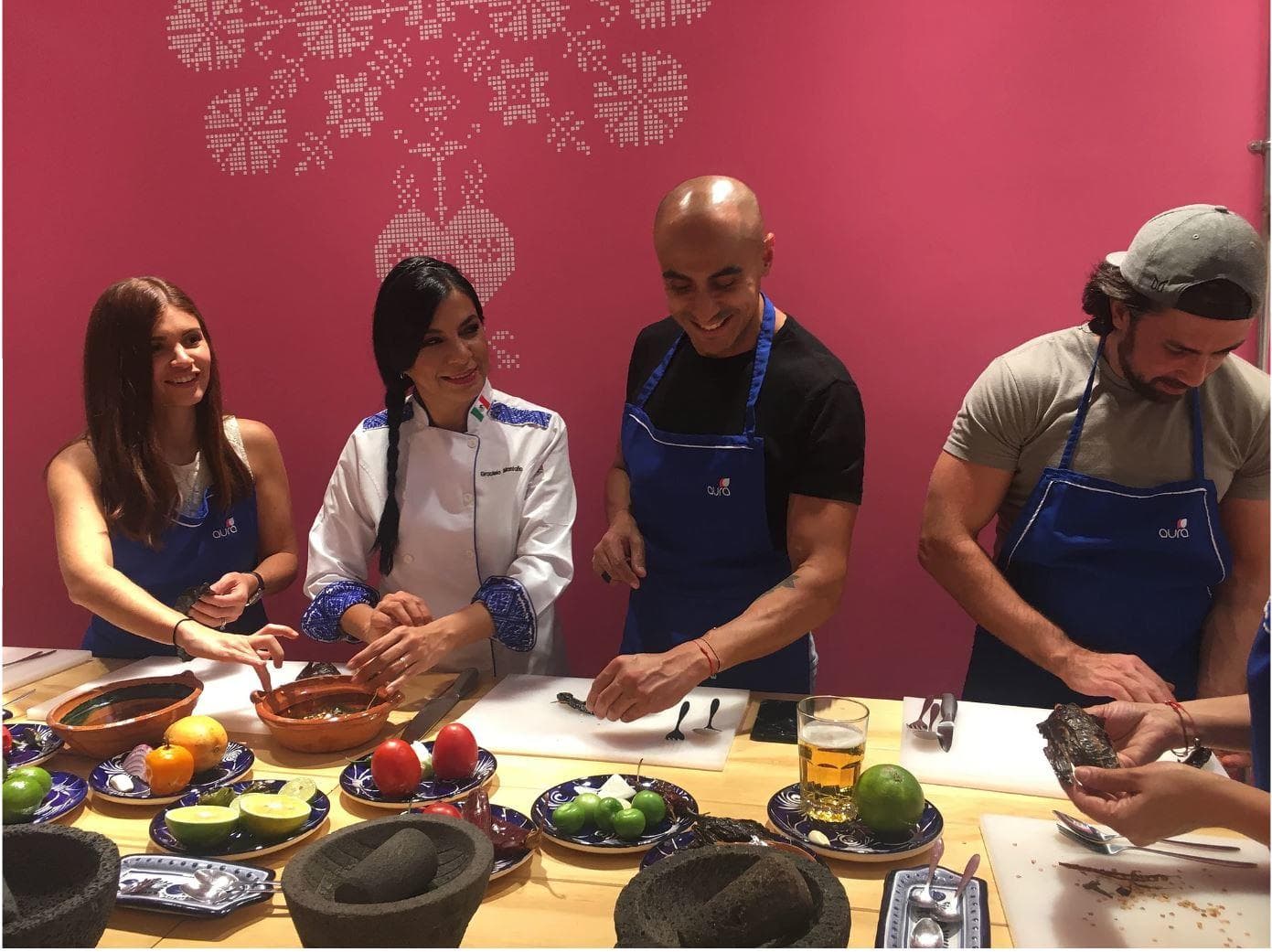 Chef-led hands-on Mexican cooking class with students at counter
