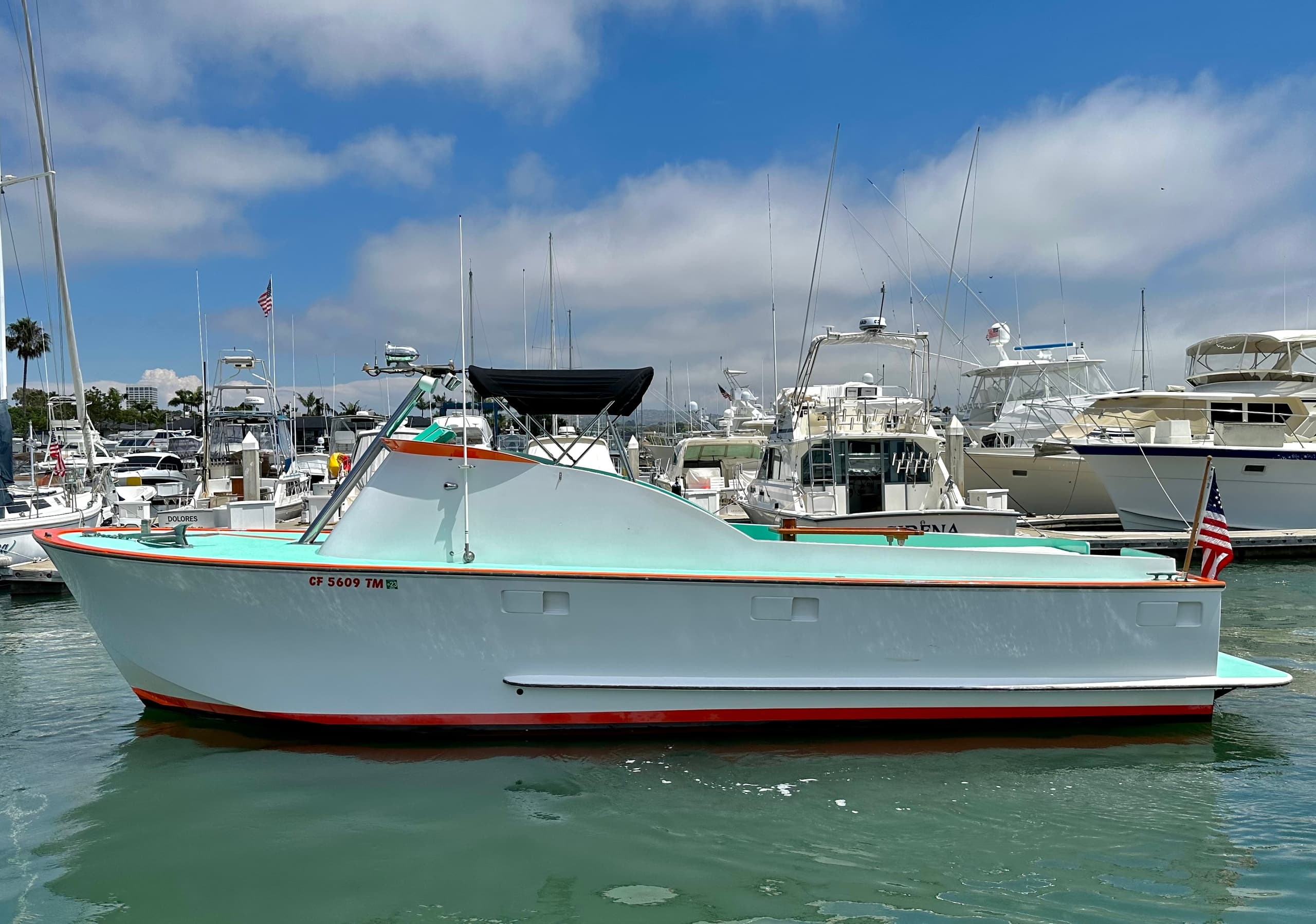 Harbor boat cruising Newport Harbor marina on coastal tour
