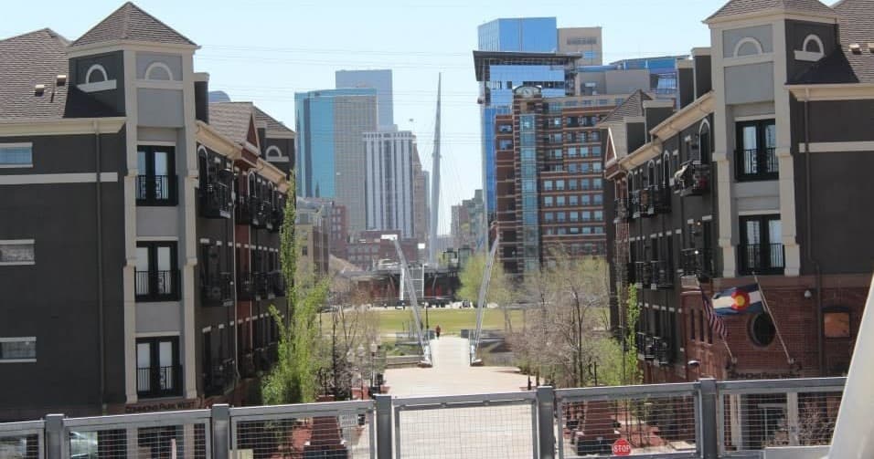 Urban Segway tour down pedestrian street toward downtown skyline
