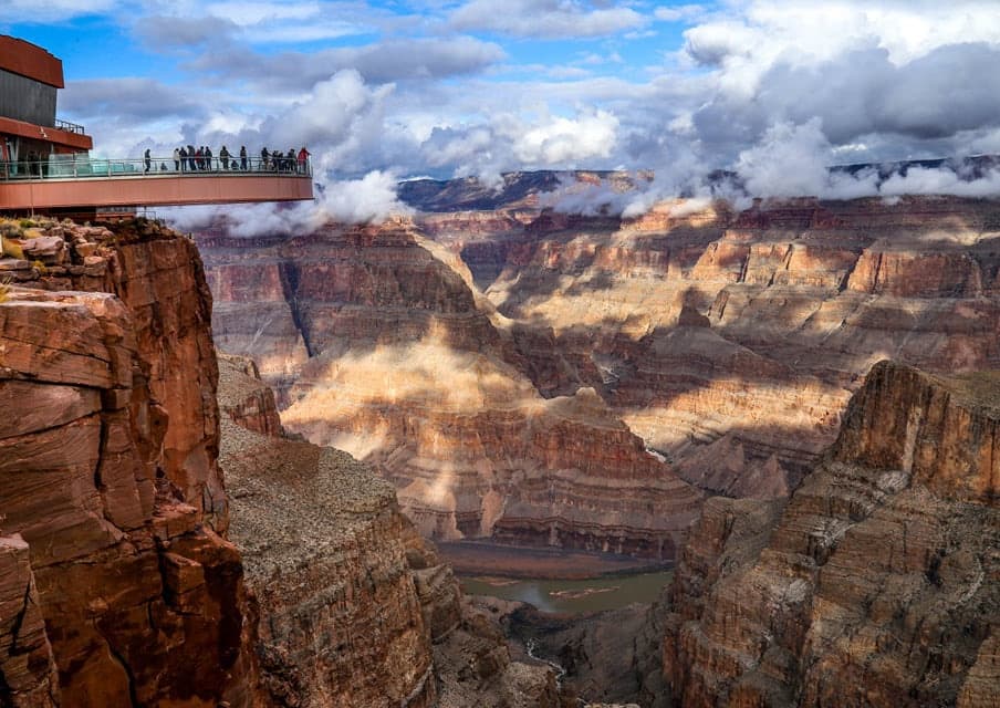 Grand Canyon Skywalk platform over canyon edge with tourists viewing