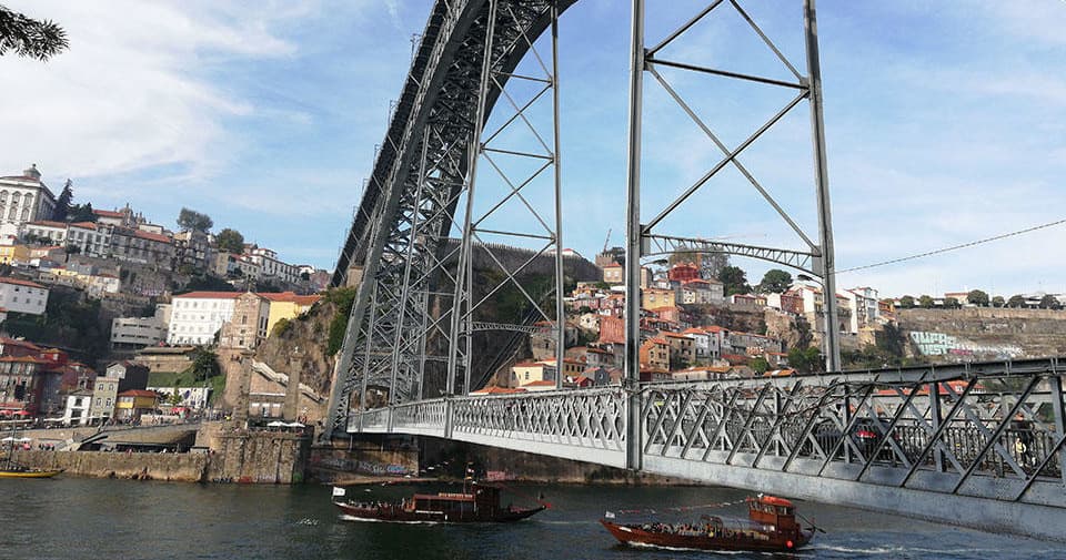 Historic river bridge and waterfront vista for scenic river tours