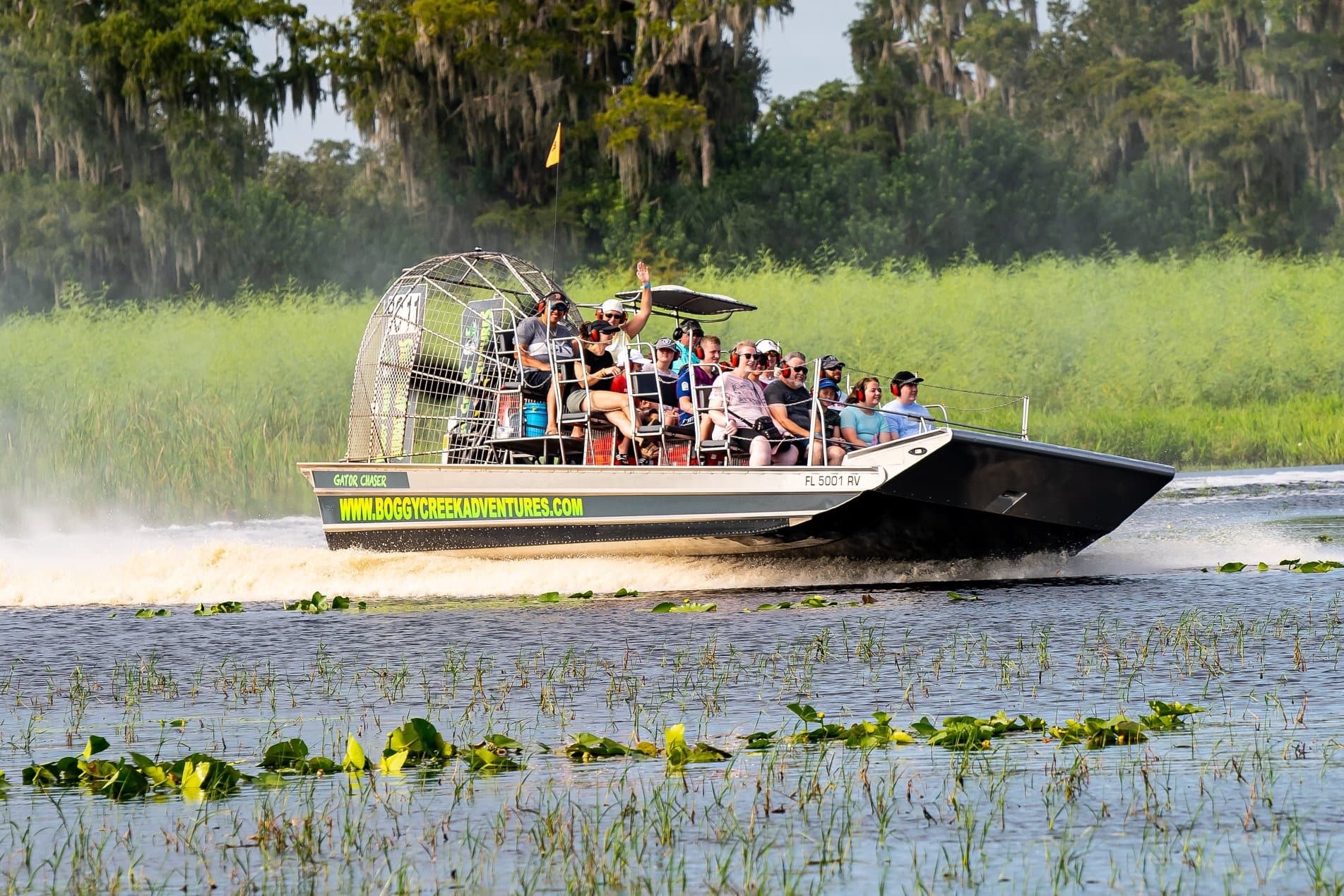 Airboat skimming Florida marsh grasses on wildlife airboat tour