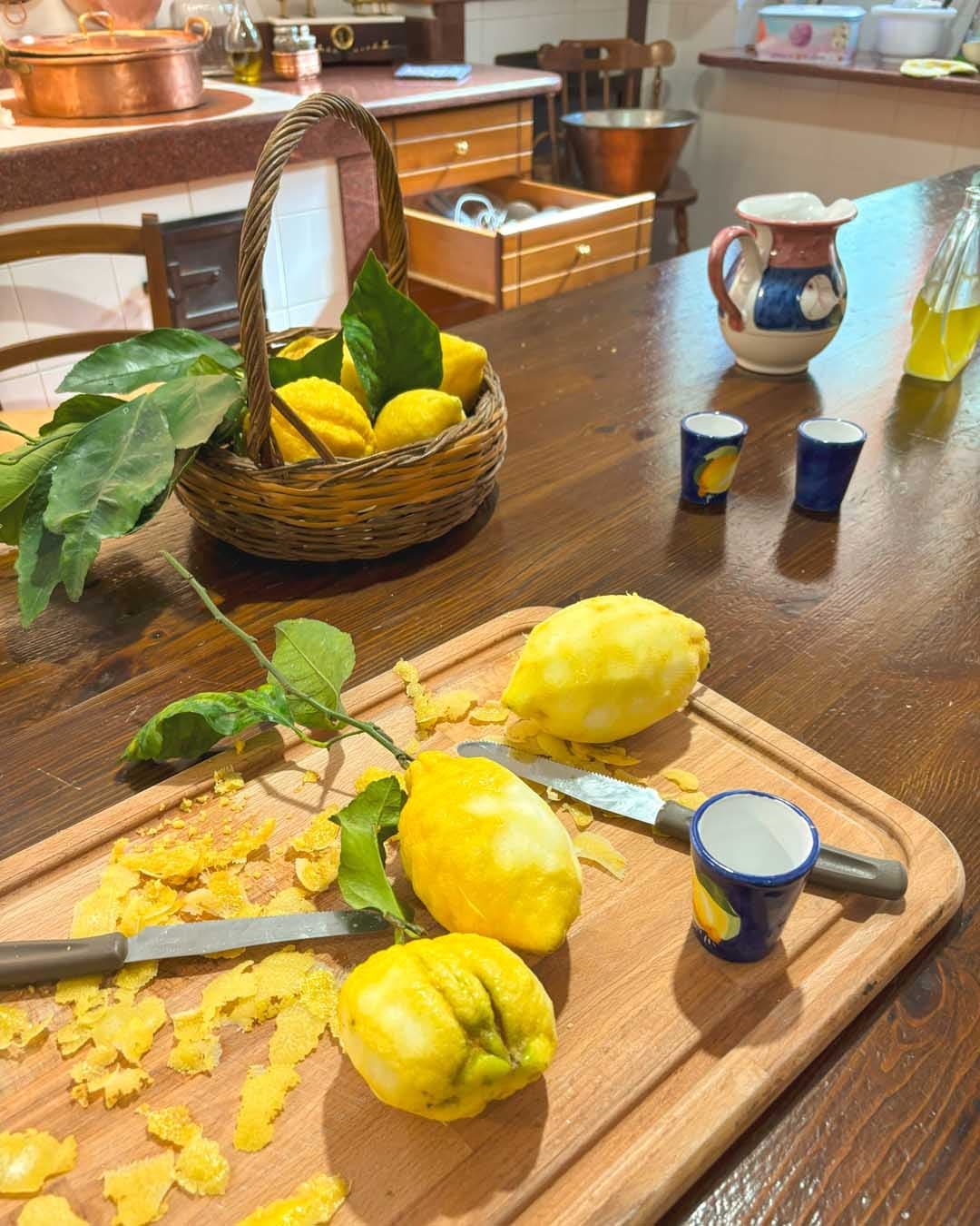 Fresh lemon harvest and zesting on wooden board in rustic kitchen