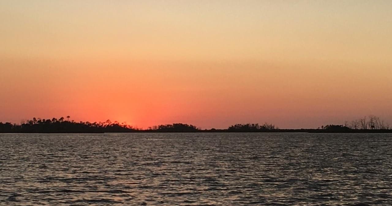 Sunset Tiki Boat Experience at Crystal River Tiki Tour